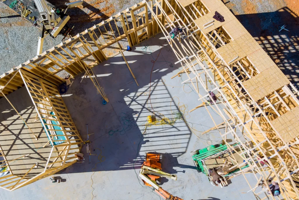 Construction Site Overview with Workers and Framework